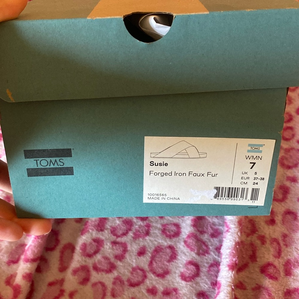 Tom’s slippers